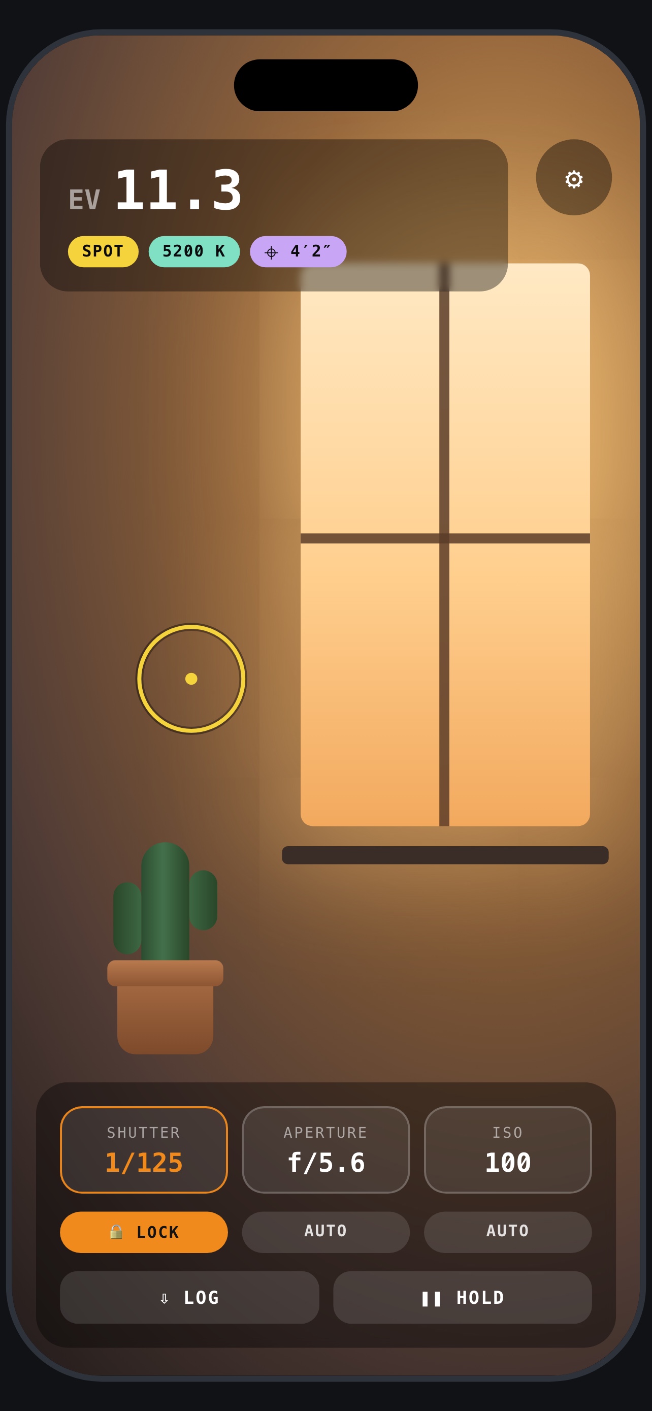App preview: live metering with spot reticle, EV readout and the shutter, aperture and ISO deck.